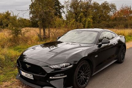 Ford Mustang 84.600 km 34.900 € Flörsheim 65439