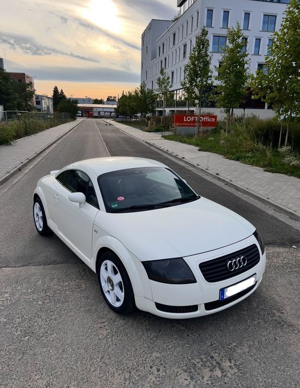 TT
