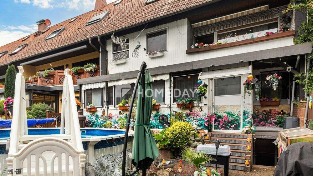 Zweifamilienhaus mit 210 m² Wohnfläche, Wintergärten, Loggia und gepflegtem Gartenparadies 1 zimmer