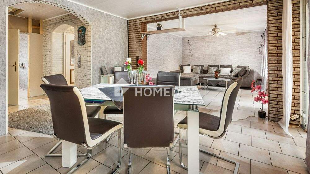 Zweifamilienhaus mit 210 m² Wohnfläche, Wintergärten, Loggia und gepflegtem Gartenparadies 1 zimmer