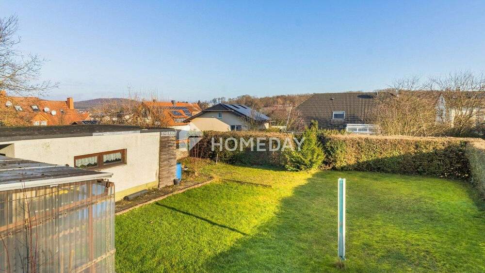 Gepflegtes MFH mit PV, Wallbox, Garagen, Balkonen & Ausbaupotenzial in ruhiger Lage 1 zimmer