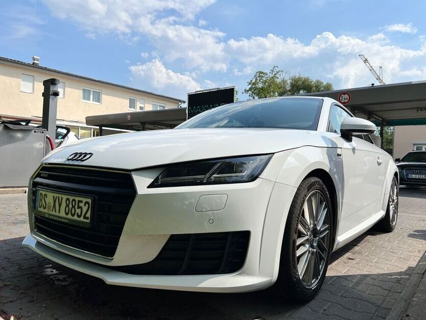 TT