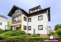 BERK Immobilien - Vielseitiges Mehrfamilienhaus mit EinliegerWohnung und Nebengebäude