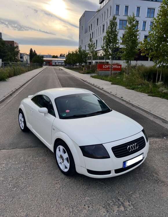 TT