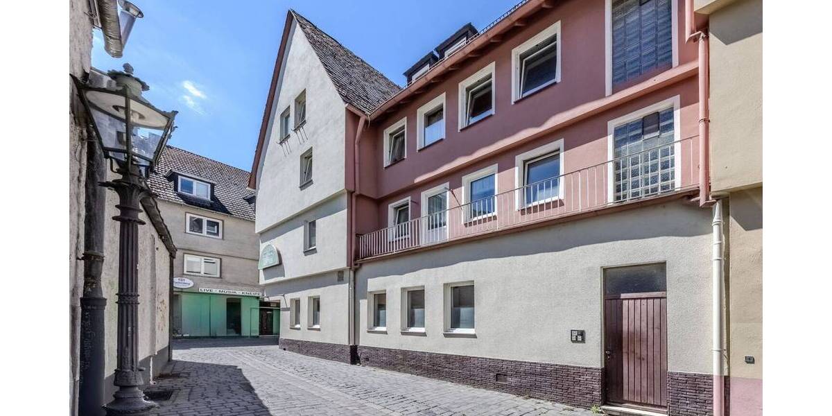 Langfristige Investitionschance in Sachsenhausen! Wohn- und Geschäftshaus in zentraler Lage 2 zimmer