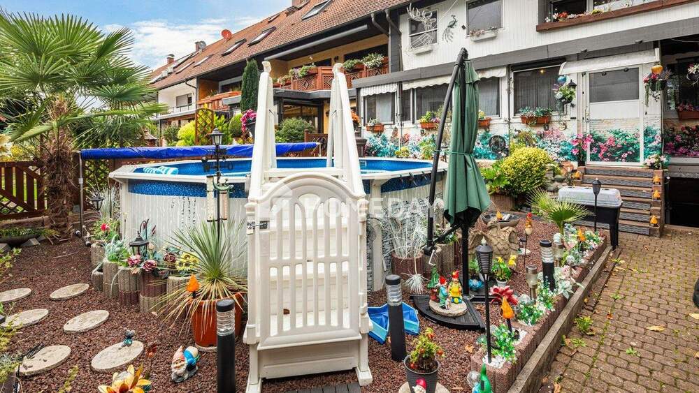 Zweifamilienhaus mit 210 m² Wohnfläche, Wintergärten, Loggia und gepflegtem Gartenparadies 1 zimmer
