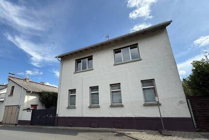 **Zwei-Familienwohnhaus in ruhiger Wohnlage von Frankfurt-Oberrad** 6 zimmer