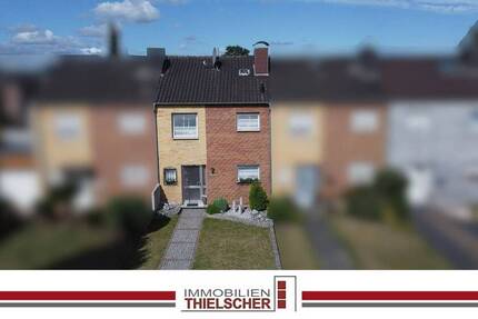 Charmantes Reihenmittelhaus mit schön angelegtem Garten und gutem Raumkonzept in zentraler Lage