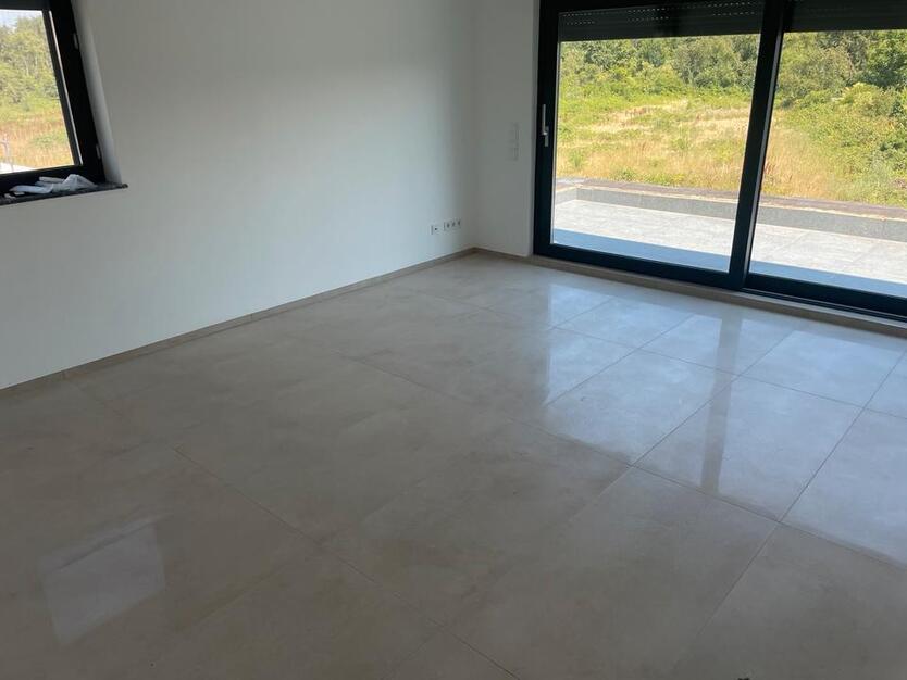 Neubau 3,5 Zimmer Erstbezug Feldrandlage