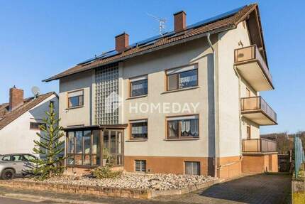 Gepflegtes MFH mit PV, Wallbox, Garagen, Balkonen & Ausbaupotenzial in ruhiger Lage 1 zimmer